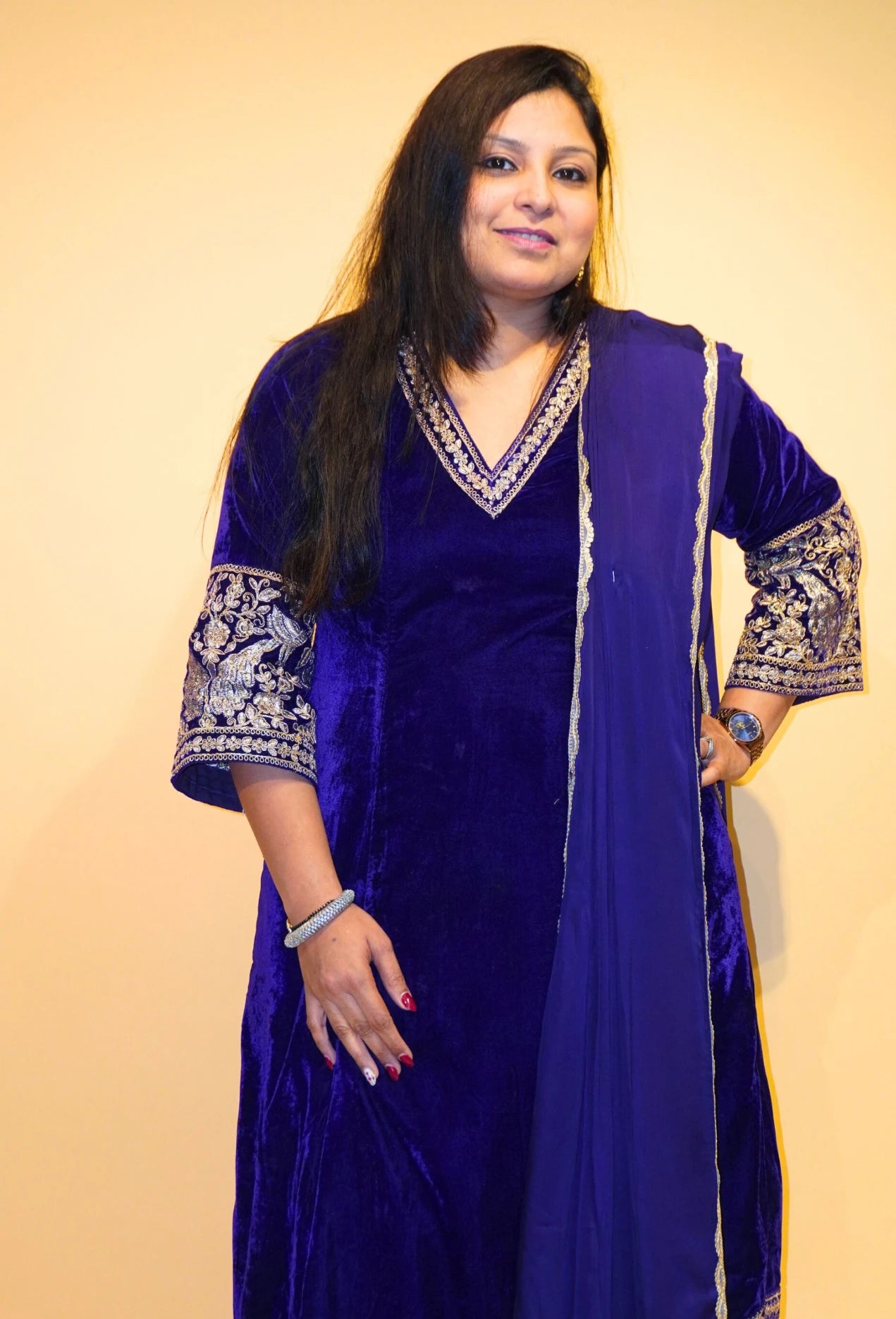 Velvet Majesty by Destiny by Anjali exudes luxury with premium velvet fabric and golden embroidery on the handcuffs and hem. Available in Royal Blue, Ebony Black, and Maroon, this elegant suit is perfect for weddings and festive occasions.&nbsp;