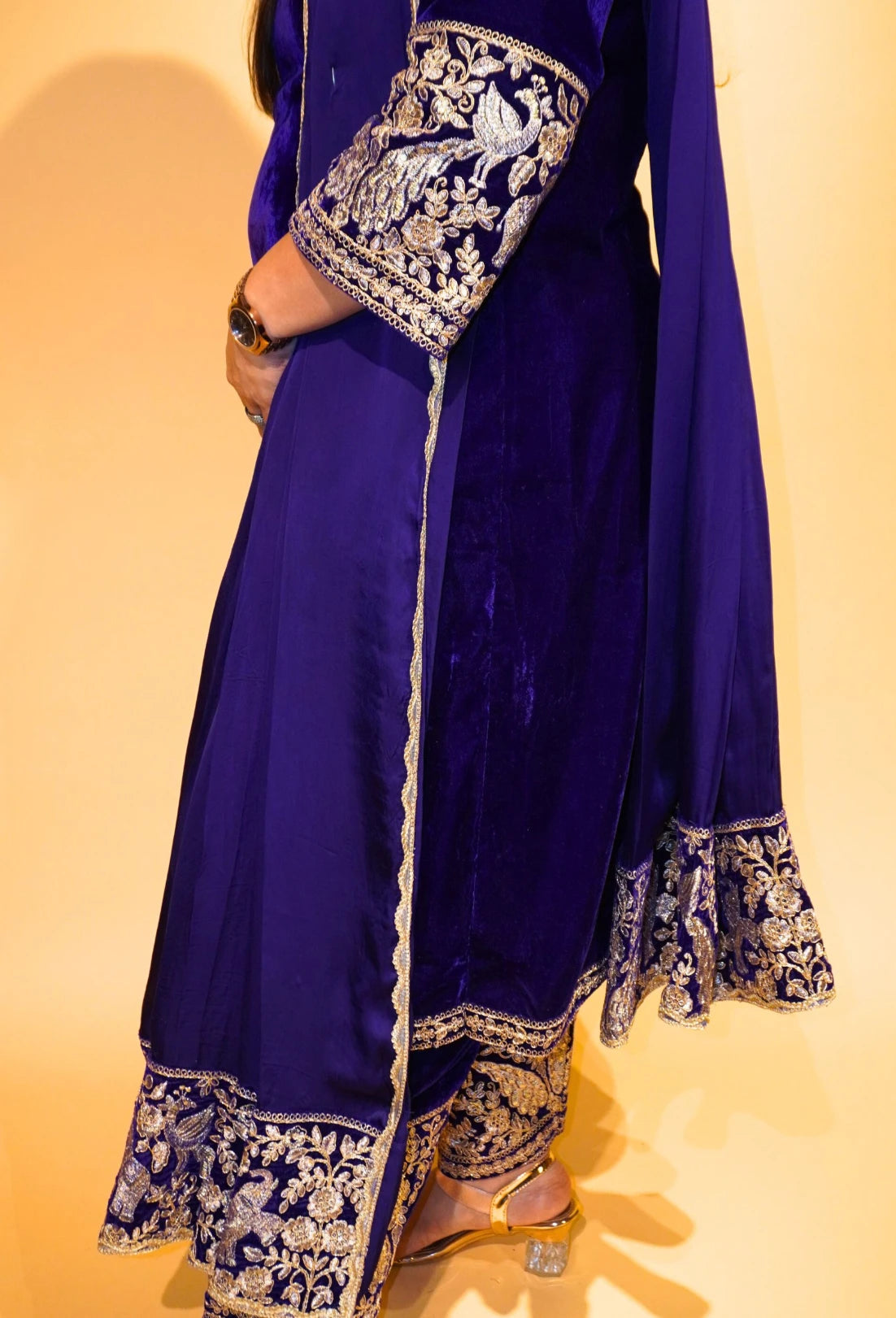 Velvet Majesty by Destiny by Anjali exudes luxury with premium velvet fabric and golden embroidery on the handcuffs and hem. Available in Royal Blue, Ebony Black, and Maroon, this elegant suit is perfect for weddings and festive occasions.&nbsp;