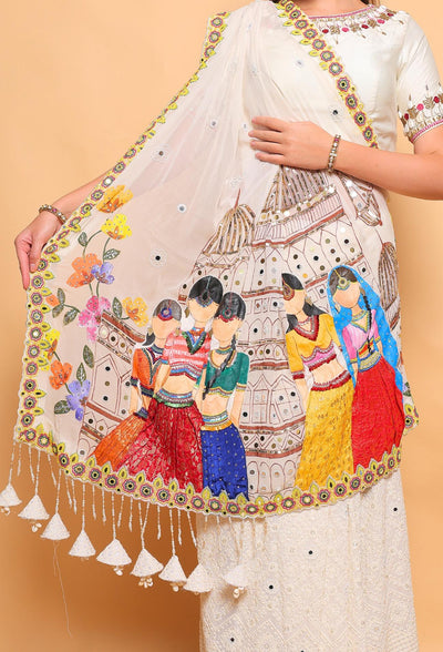 Embroidered saree with colorful designs on a beige background
