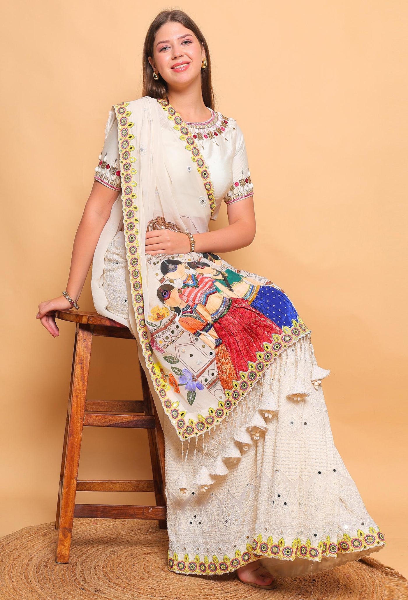 Elysium Adore - Hand embroidered Saree with potli