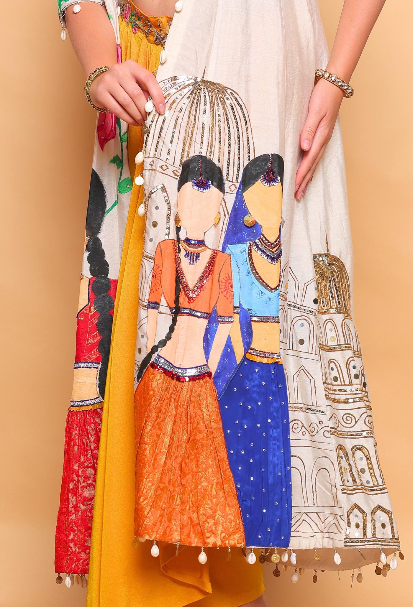 Colorful traditional outfit with intricate designs on a beige background