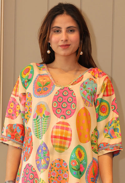 Introducing Peatchy Cuts - the epitome of effortless style. This baggy sleeve tunic kurti set from designer wear brand Destiny by Anjali is made with a luxuriously comfortable cotton linen fabric and is fully lined. Perfect for the summer season, this set features the trendy baggy sleeves and bold hot pink and blossom colors. Experience the luxury and exclusivity with Peatchy Cuts.
