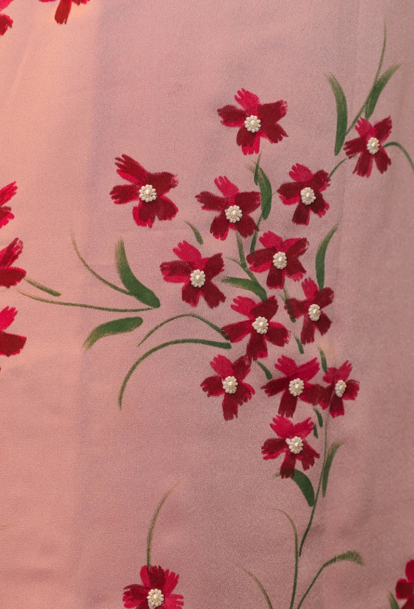 Experience the beauty of nature with Floral Desire. This hand painted and hand embroidered suit features a stunning floral design on imported armani satin fabric. With a delicate noodle strap neckline, this suit is a true masterpiece from designer brand Destiny by Anjali. Elevate your style and embrace the art of nature.