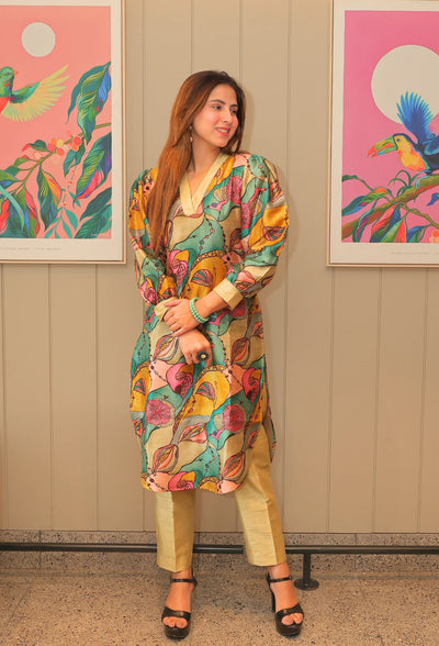 Indulge in the luxurious Ishq-e-rang Camisole Kurti Set from Destiny by Anjali. Made with passion and crafted from a smooth and breathable cotton silk fabric, this set features a perfect blend of elegance and comfort. Its vibrant colors resemble the beautiful shades of love, making it the perfect choice for a stylish and chic summer look. The fabric has a self shiny look which embraces in natural lighting.