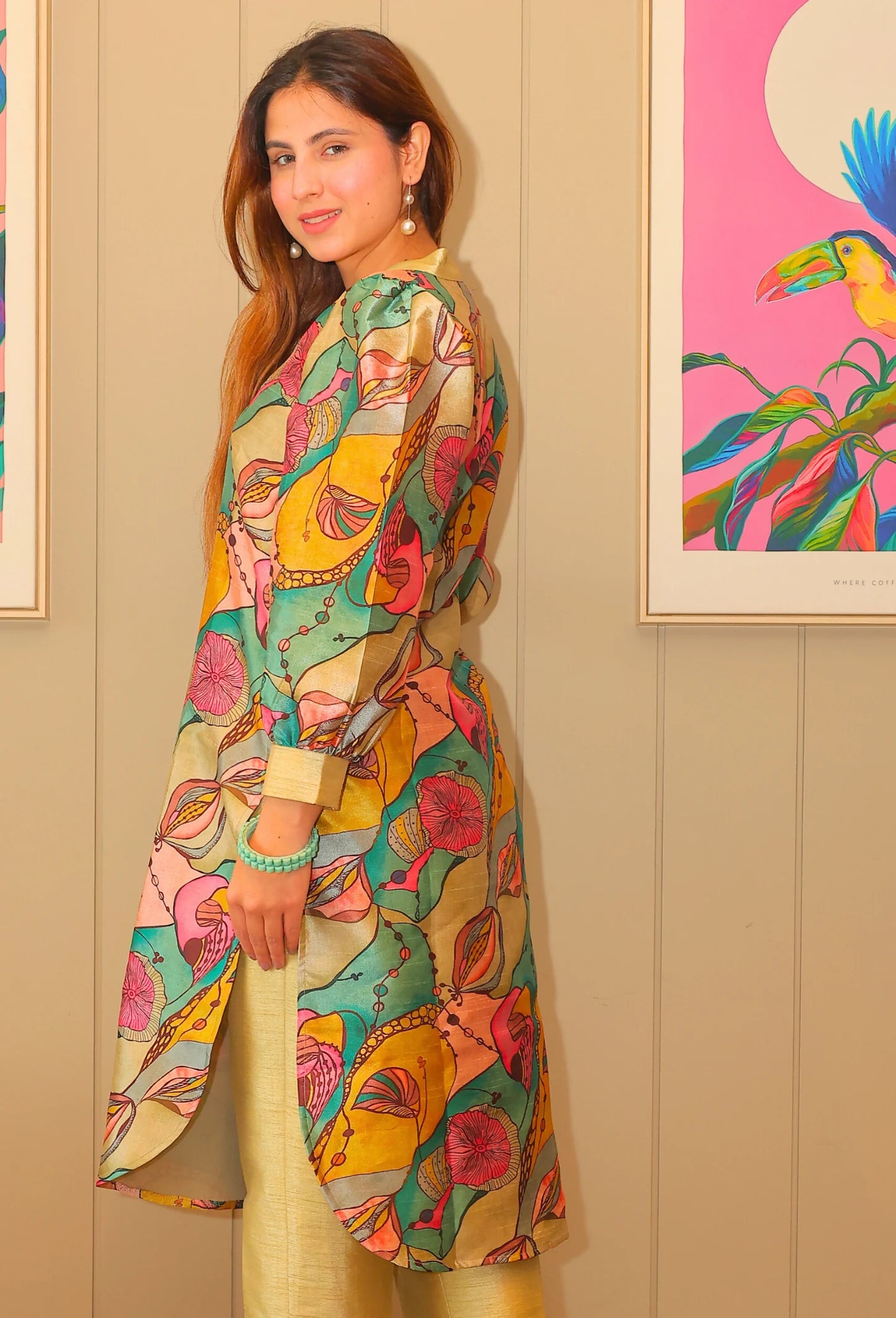 Indulge in the luxurious Ishq-e-rang Camisole Kurti Set from Destiny by Anjali. Made with passion and crafted from a smooth and breathable cotton silk fabric, this set features a perfect blend of elegance and comfort. Its vibrant colors resemble the beautiful shades of love, making it the perfect choice for a stylish and chic summer look. The fabric has a self shiny look which embraces in natural lighting.