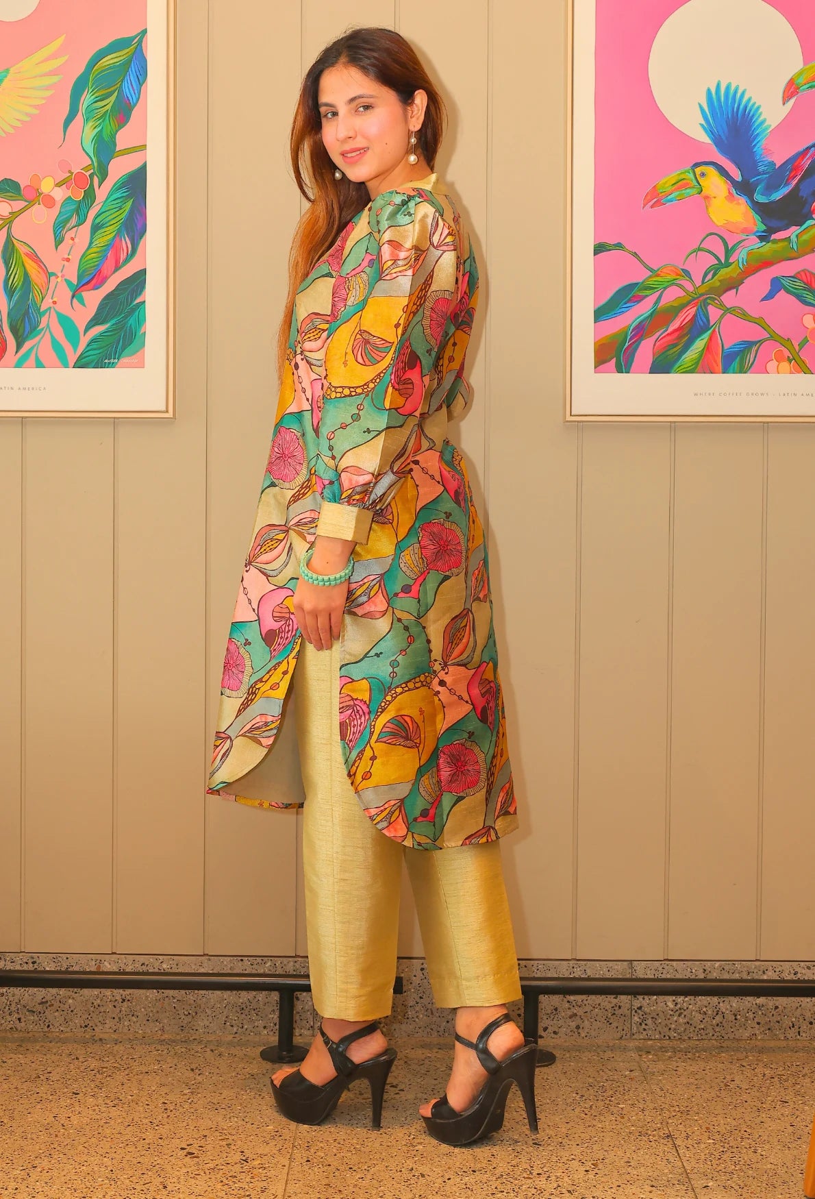 Indulge in the luxurious Ishq-e-rang Camisole Kurti Set from Destiny by Anjali. Made with passion and crafted from a smooth and breathable cotton silk fabric, this set features a perfect blend of elegance and comfort. Its vibrant colors resemble the beautiful shades of love, making it the perfect choice for a stylish and chic summer look. The fabric has a self shiny look which embraces in natural lighting.