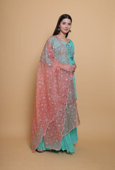 Destiny by Anjali: Tropical Blue Sharara Suit. Embroidered upada silk with Embroidered Pink Net Dupatta. Sharara fashion, designer clothing, unique color.
