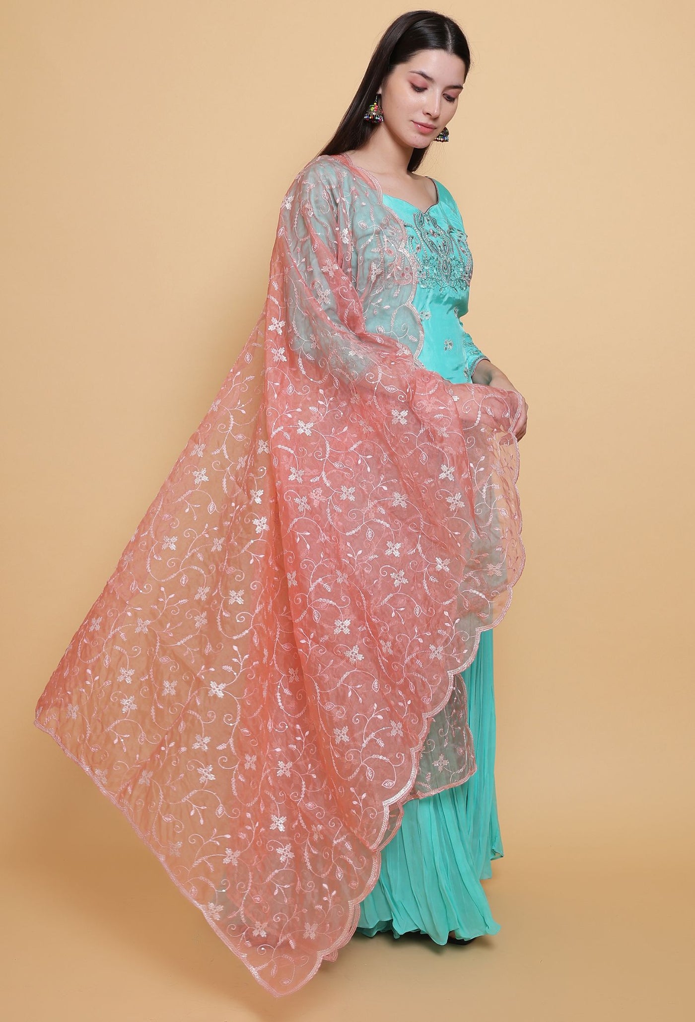 Destiny by Anjali: Tropical Blue Sharara Suit. Embroidered upada silk with Embroidered Pink Net Dupatta. Sharara fashion, designer clothing, unique color.