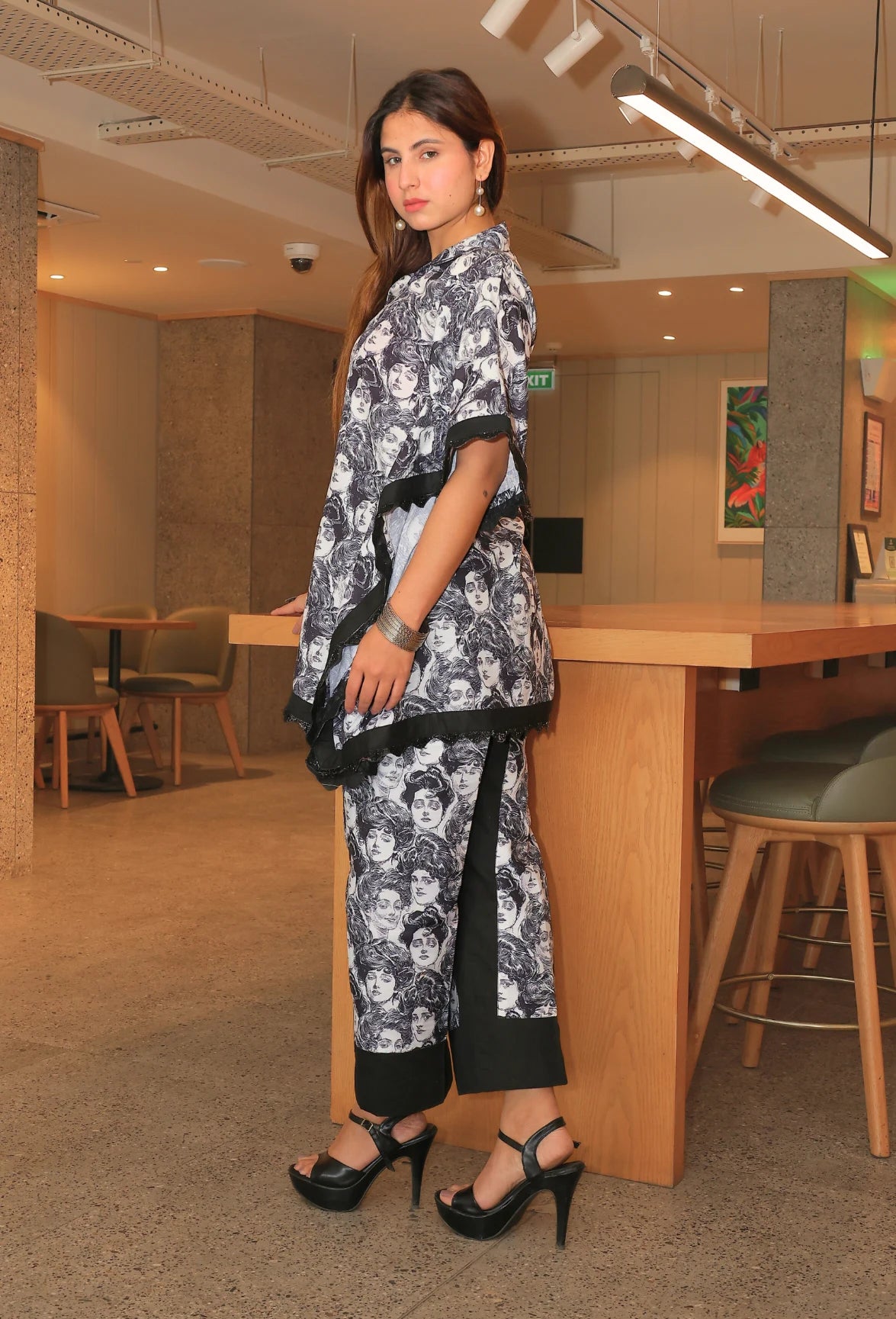Introducing "Timeless Faces" by Destiny by Anjali - the perfect kaftan-shaped coord set for the modern, sophisticated woman. Made with a light and breathable cotton linen fabric, accented with beautiful lace, this Western-style dress is ideal for summer. Elevate your wardrobe with this trendy, collared kaftan coord set.